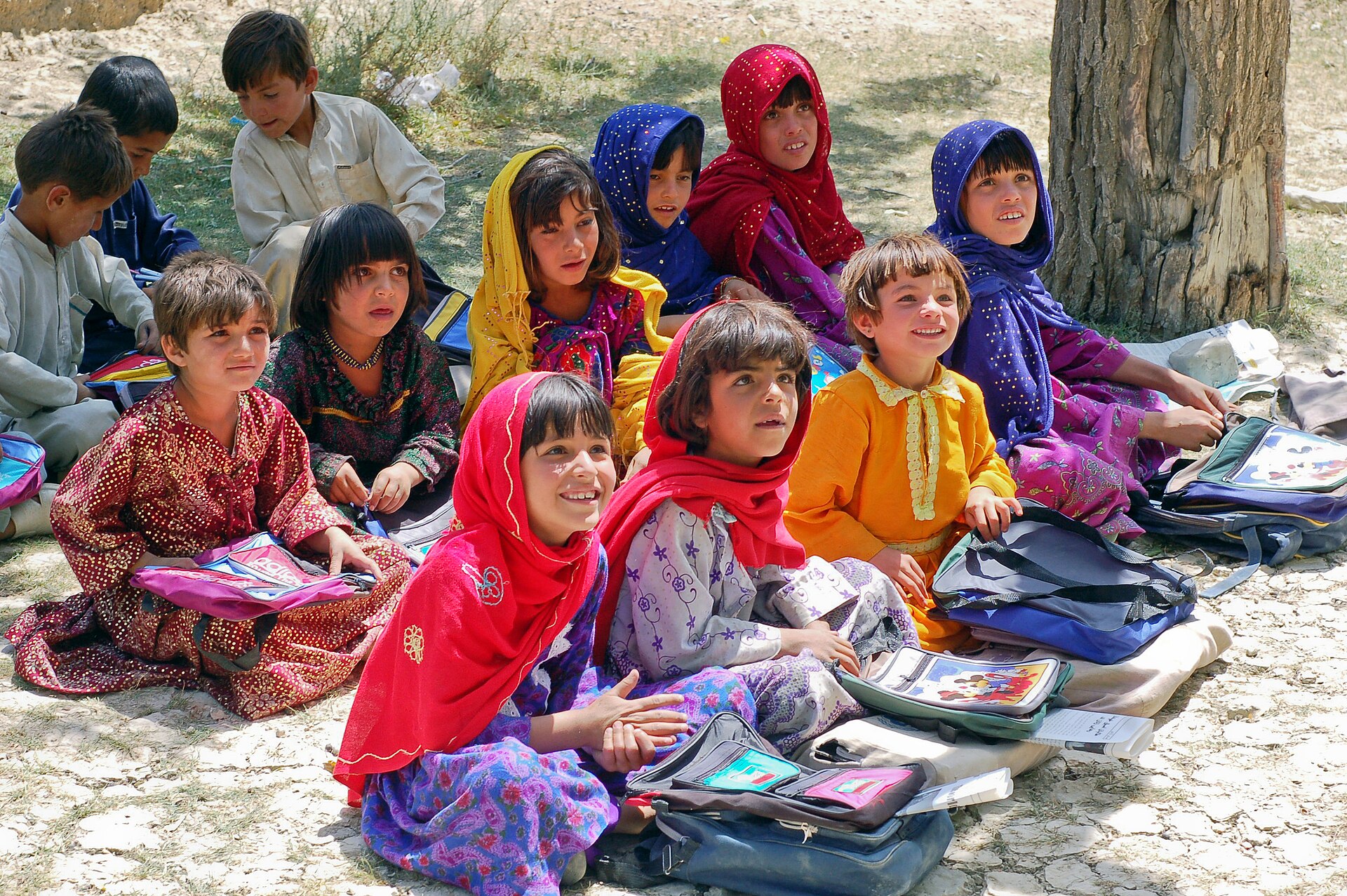 Schoolgirls at an open-air class in Bamozai, Paktya province, Afghanistan